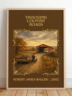 Thousand Country Roads Classic Book Art Print by Robert James Waller – framed print leaning on a wooden floor