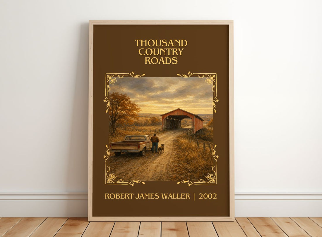 Thousand Country Roads Classic Book Art Print by Robert James Waller – framed print leaning on a wooden floor