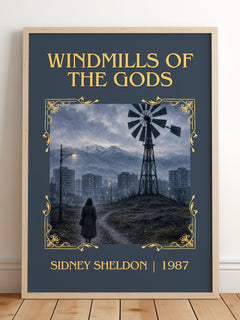 Windmills Of The Gods Classic Book Art Print by Sidney Sheldon – framed print leaning on a wooden floor