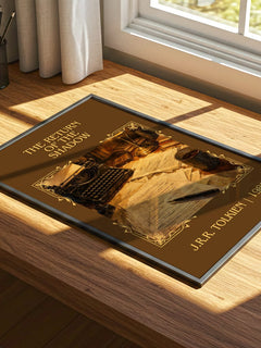 The Return Of The Shadow Classic Book Art Print by J.R.R. Tolkien – print on a sunlit desk
