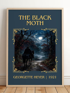 The Black Moth Classic Book Art Print by Georgette Heyer – framed print leaning on a wooden floor