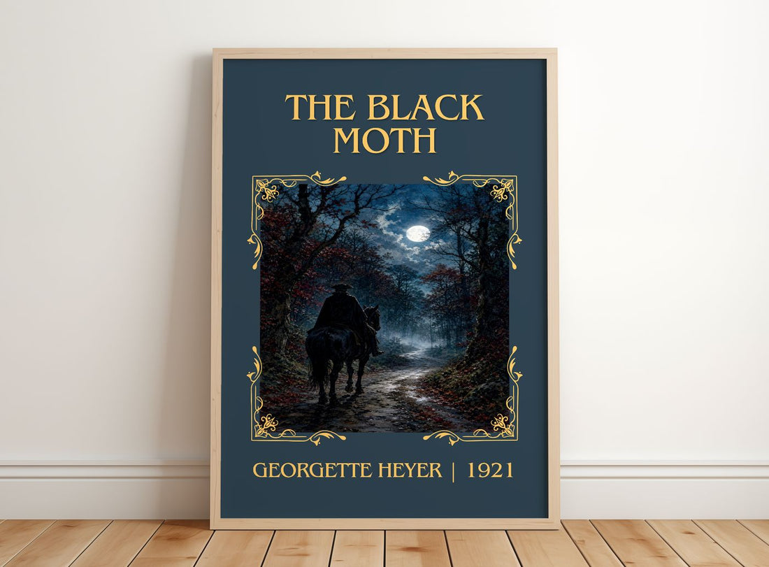 The Black Moth Classic Book Art Print by Georgette Heyer – framed print leaning on a wooden floor