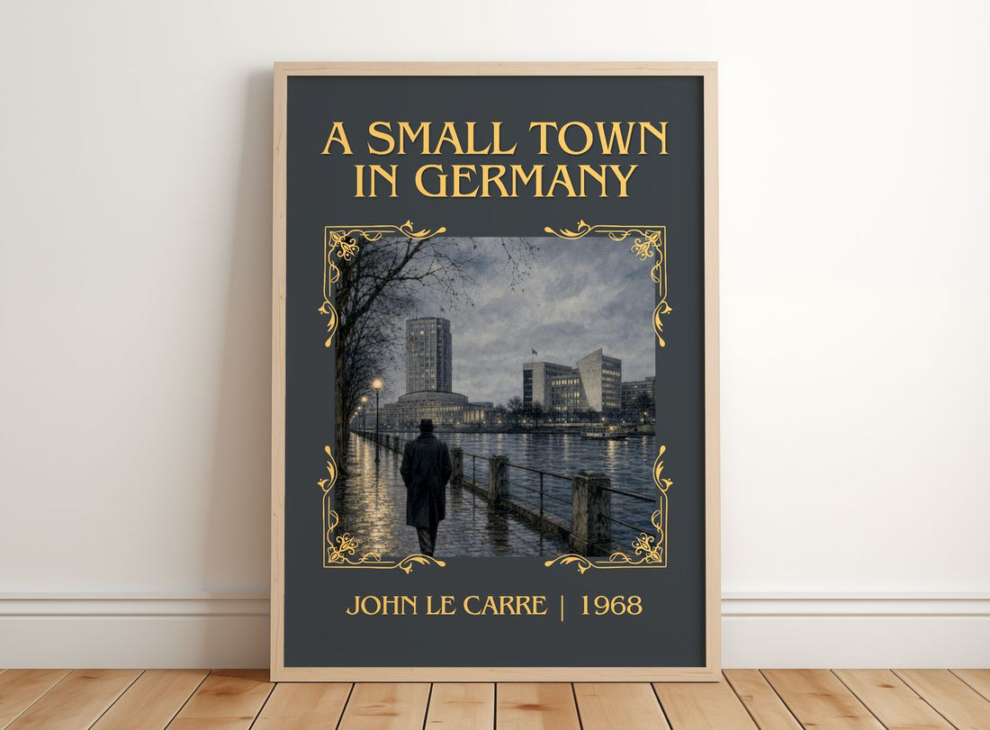 A Small Town in Germany Classic Book Art Print by John le Carré – framed print leaning on a wooden floor