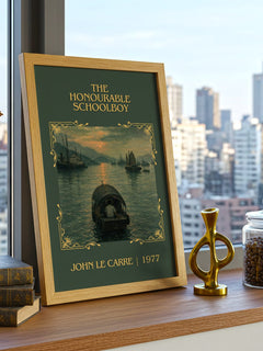 The Honourable Schoolboy Classic Book Art Print by John le Carré – framed print on a city-view windowsill
