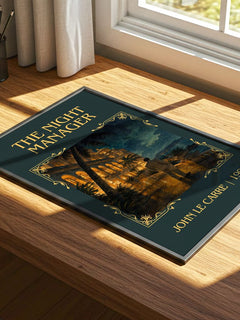 The Night Manager Classic Book Art Print by John le Carré – print on a sunlit desk
