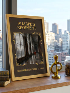 Sharpe's Regiment Classic Book Art Print by Bernard Cornwell – framed print on a city-view windowsill