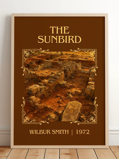 The Sunbird Classic Book Art Print by Wilbur Smith – framed print leaning on a wooden floor