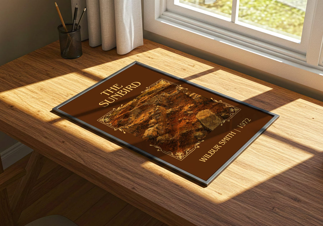 The Sunbird Classic Book Art Print by Wilbur Smith – print on a sunlit desk