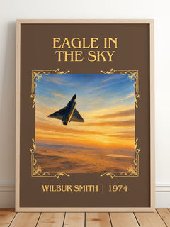 Eagle in the Sky Classic Book Art Print by Wilbur Smith – framed print leaning on a wooden floor