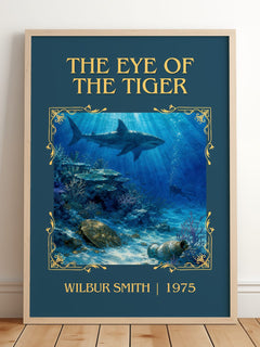 The Eye of the Tiger Classic Book Art Print by Wilbur Smith – framed print leaning on a wooden floor
