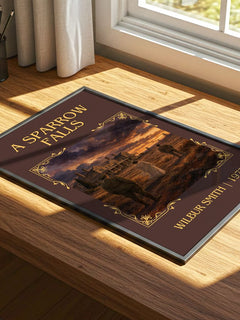 A Sparrow Falls Classic Book Art Print by Wilbur Smith – print on a sunlit desk
