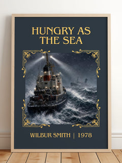Hungry as the Sea Classic Book Art Print by Wilbur Smith – framed print leaning on a wooden floor