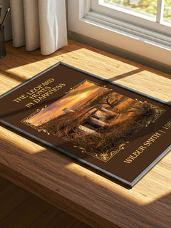 The Leopard Hunts in Darkness Classic Book Art Print by Wilbur Smith – print on a sunlit desk