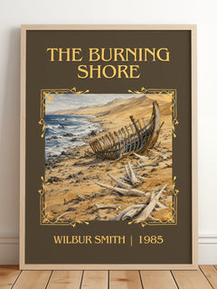 The Burning Shore Classic Book Art Print by Wilbur Smith – framed print leaning on a wooden floor
