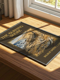 The Burning Shore Classic Book Art Print by Wilbur Smith – print on a sunlit desk