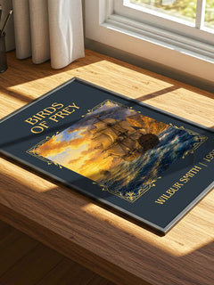 Birds of Prey Classic Book Art Print by Wilbur Smith – print on a sunlit desk