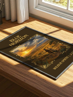 Blue Horizon Classic Book Art Print by Wilbur Smith – print on a sunlit desk
