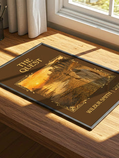 The Quest Classic Book Art Print by Wilbur Smith – print on a sunlit desk