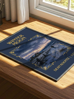 Winter Moon Classic Book Art Print by Dean Koontz – print on a sunlit desk