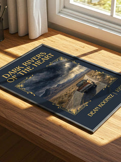 Dark Rivers of the Heart Classic Book Art Print by Dean Koontz – print on a sunlit desk