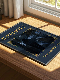 Intensity Classic Book Art Print by Dean Koontz – print on a sunlit desk