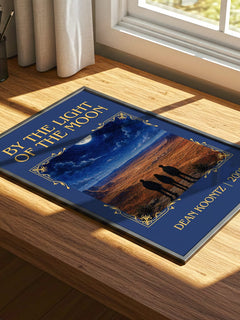 By the Light of the Moon Classic Book Art Print by Dean Koontz – print on a sunlit desk