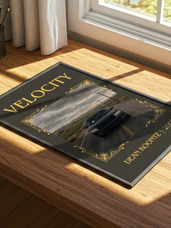 Velocity Classic Book Art Print by Dean Koontz – print on a sunlit desk