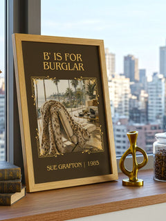 B' Is for Burglar Classic Book Art Print by Sue Grafton – framed print on a city-view windowsill
