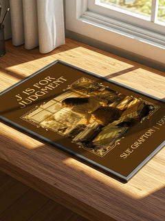 J' Is for Judgment Classic Book Art Print by Sue Grafton – print on a sunlit desk
