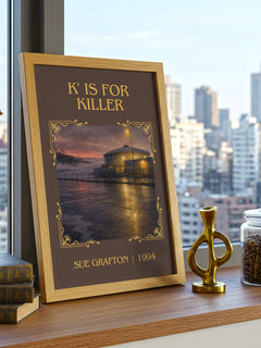K' Is for Killer Classic Book Art Print by Sue Grafton – framed print on a city-view windowsill