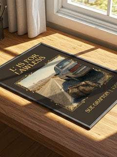 L' Is for Lawless Classic Book Art Print by Sue Grafton – print on a sunlit desk