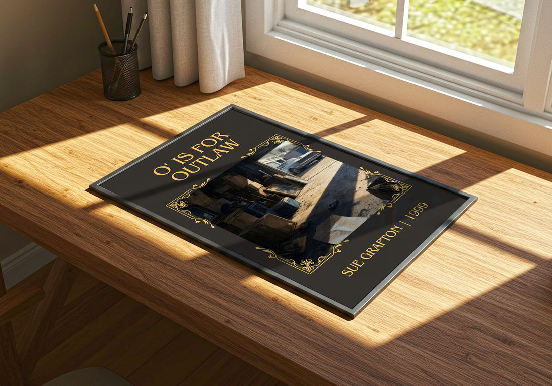O' Is for Outlaw Classic Book Art Print by Sue Grafton – print on a sunlit desk