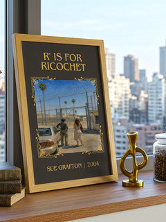 R' Is for Ricochet Classic Book Art Print by Sue Grafton – framed print on a city-view windowsill
