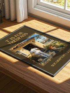 T' Is for Trespass Classic Book Art Print by Sue Grafton – print on a sunlit desk