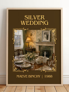 Silver Wedding Classic Book Art Print by Maeve Binchy – framed print leaning on a wooden floor