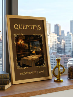 Quentins Classic Book Art Print by Maeve Binchy – framed print on a city-view windowsill