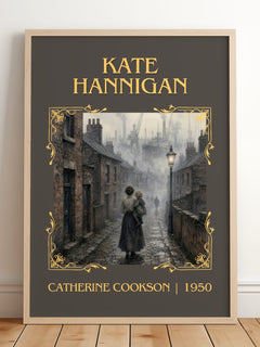 Kate Hannigan Classic Book Art Print by Catherine Cookson – framed print leaning on a wooden floor