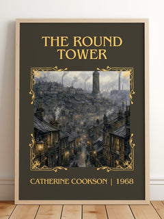 The Round Tower Classic Book Art Print by Catherine Cookson – framed print leaning on a wooden floor