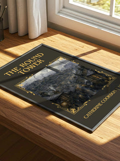 The Round Tower Classic Book Art Print by Catherine Cookson – print on a sunlit desk
