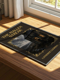 The Mallen Streak Classic Book Art Print by Catherine Cookson – print on a sunlit desk