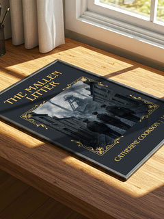 The Mallen Litter Classic Book Art Print by Catherine Cookson – print on a sunlit desk