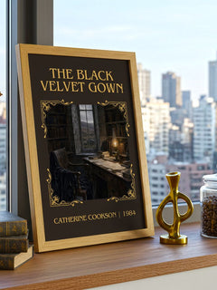 The Black Velvet Gown Classic Book Art Print by Catherine Cookson – framed print on a city-view windowsill