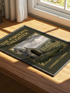 The Parson's Daughter Classic Book Art Print by Catherine Cookson – print on a sunlit desk