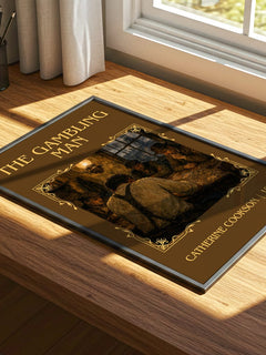 The Gambling Man Classic Book Art Print by Catherine Cookson – print on a sunlit desk