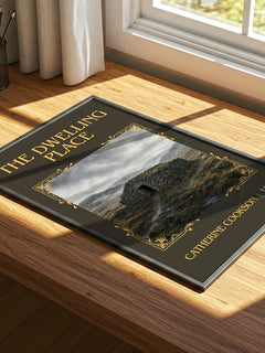 The Dwelling Place Classic Book Art Print by Catherine Cookson – print on a sunlit desk