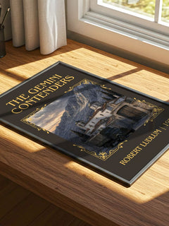 The Gemini Contenders Classic Book Art Print by Robert Ludlum – print on a sunlit desk