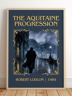 The Aquitaine Progression Classic Book Art Print by Robert Ludlum – framed print leaning on a wooden floor