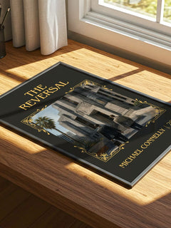 The Reversal Classic Book Art Print by Michael Connelly – print on a sunlit desk