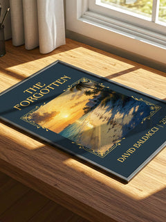 The Forgotten Classic Book Art Print by David Baldacci – print on a sunlit desk
