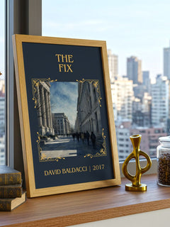 The Fix Classic Book Art Print by David Baldacci – framed print on a city-view windowsill